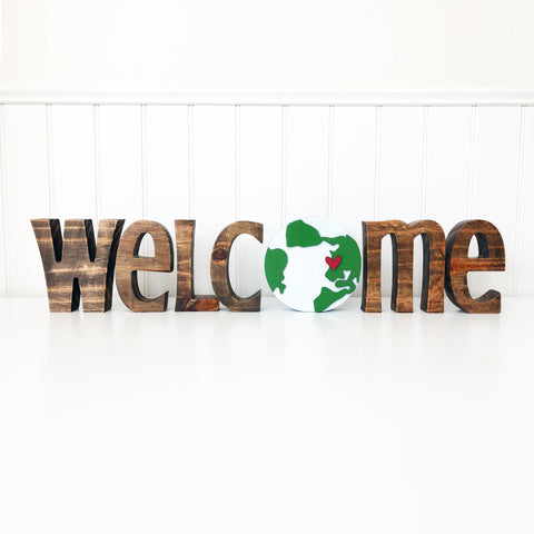"Welcome" - thick letters, trendy font