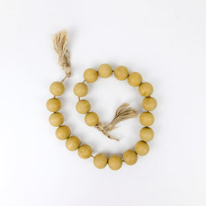 24" Bamboo Wood Bead Garland with Tassels - Amber